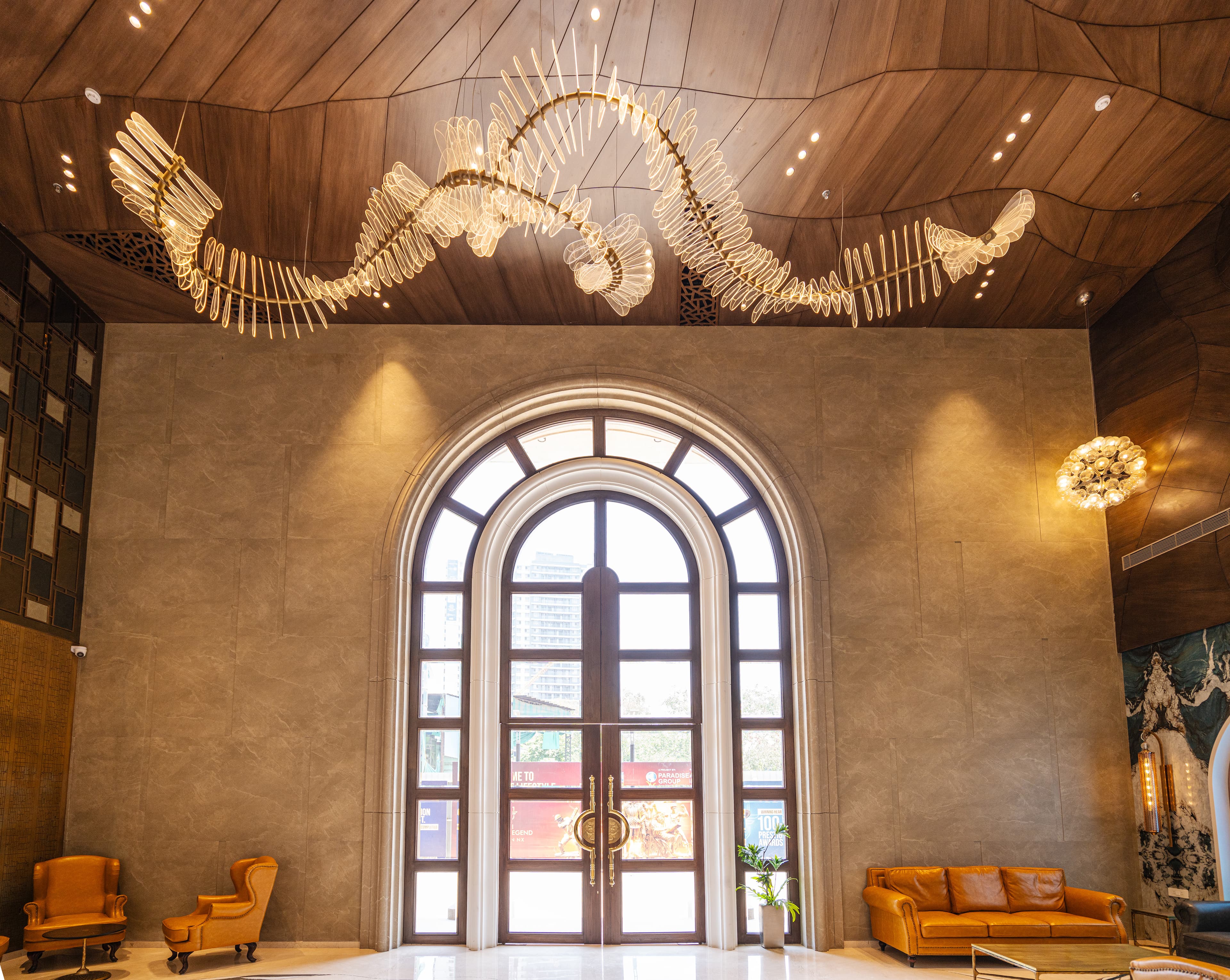 Room with multiple arched doorways and woven ceiling